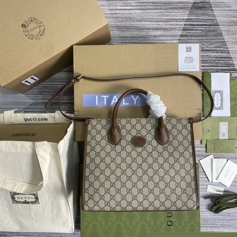 G*u*i shopping bags